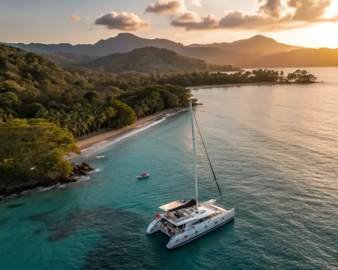 Couple sailing a private catamaran sunset cruise off the coast of Jaco, Costa Rica