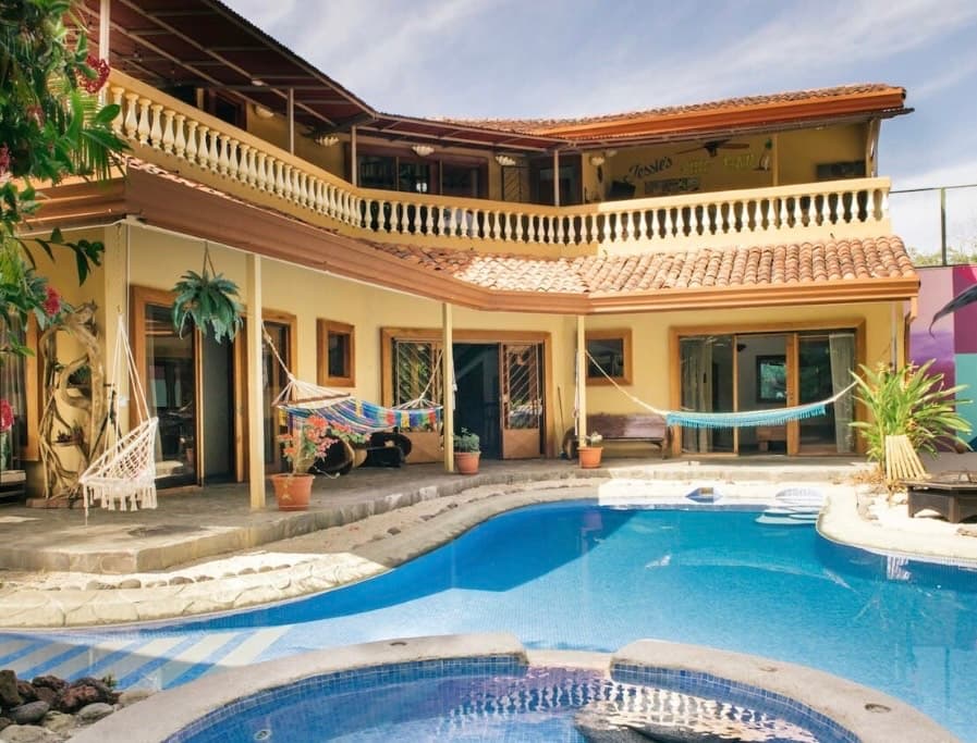 PV Villa Mediterranean-style estate with pool, jacuzzi, hammocks and tropical landscaping in Jaco Beach